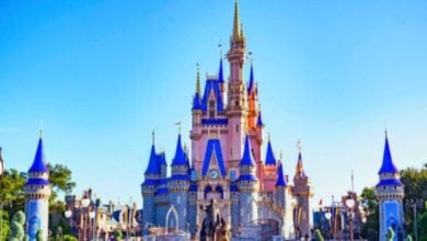 The Mickey and Walt statue in front of Cinderella's Castle inside Disney's Magic Kingdom